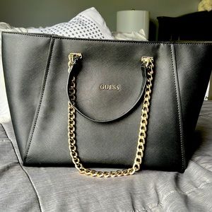 Never used, still has plastic on the hardware!